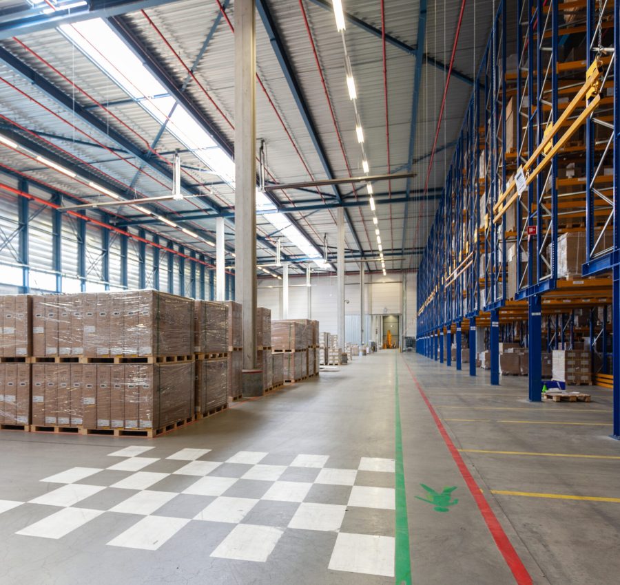 A view of full warehouse with forklift